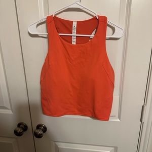 Lululemon Invigorate Train Tank. Size 14. Neon Coral/orange color. NWT
